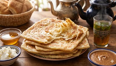 Stack of golden Moroccan msemen flatbread squares